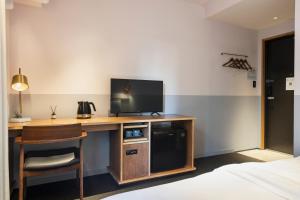 TV a/nebo společenská místnost v ubytování Hotel Asakusa KANNONURA