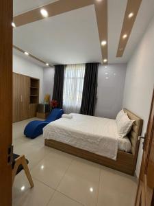 Postel nebo postele na pokoji v ubytování Hà Linh Hotel Vũng Tàu