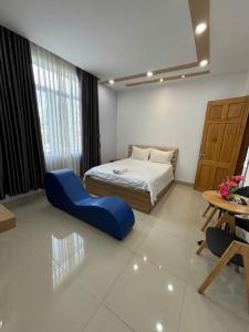 Postel nebo postele na pokoji v ubytování Hà Linh Hotel Vũng Tàu