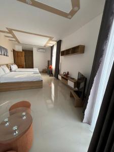 Postel nebo postele na pokoji v ubytování Hà Linh Hotel Vũng Tàu