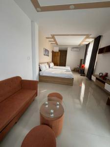 Postel nebo postele na pokoji v ubytování Hà Linh Hotel Vũng Tàu
