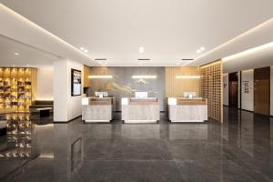 Vstupní hala nebo recepce v ubytování Atour Hotel Hangzhou Xiaoshan Airport Airport Town