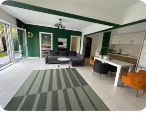 a living room with a couch and a table at DLK Deluxe Suit in Istanbul