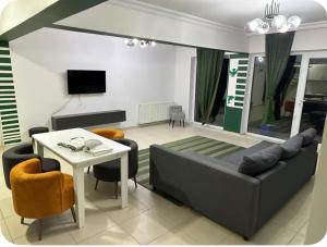 a living room with a couch and a table at DLK Deluxe Suit in Istanbul