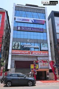 a black car parked in front of a building at Skyline backpackers in Hyderabad