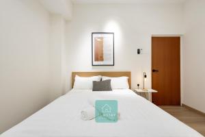 Ένα ή περισσότερα κρεβάτια σε δωμάτιο στο Jomstay MUJI 19 & 7 INN Ipoh Garden 8-10 pax