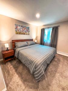 Ένα ή περισσότερα κρεβάτια σε δωμάτιο στο Modern Downtown Stay