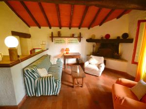 A seating area at Holiday Home in Tuscany near Abetone Ski Lift