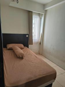 Ένα ή περισσότερα κρεβάτια σε δωμάτιο στο annora living