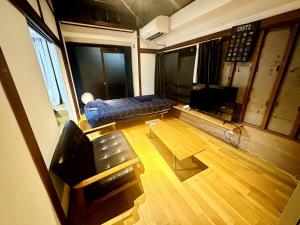 Posezení v ubytování AMs house 5 min to Ikebukuro 13 min to Shinjuku Station 19 min to Shibuya Station
