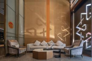 Posezení v ubytování Amanda Hotel堆谷里酒店