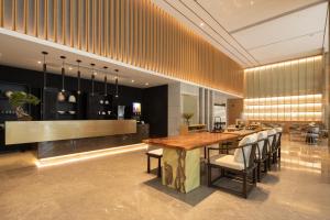 Nápoje v ubytování Amanda Hotel堆谷里酒店