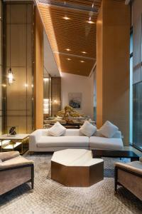 Posezení v ubytování Amanda Hotel堆谷里酒店