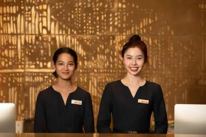 Členové personálu v ubytování Amanda Hotel堆谷里酒店