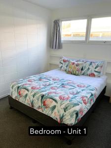 Ένα ή περισσότερα κρεβάτια σε δωμάτιο στο Rotorua Stay