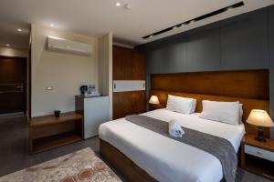 Voodi või voodid majutusasutuse Pyramids Yard Hotel toas