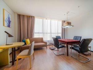 Χώρος καθιστικού στο Echarm Hotel Foshan West Station Shishan Luocun