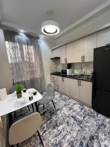 Kuchyň nebo kuchyňský kout v ubytování OS Shaumyana