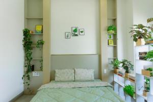 Postel nebo postele na pokoji v ubytování Nha Trong Pho - Moon House