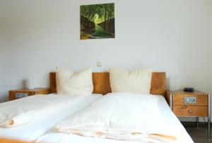 Ein Bett oder Betten in einem Zimmer der Unterkunft Apartmentcenter Koblenz