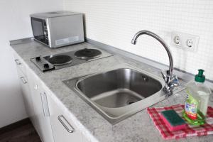 Küche/Küchenzeile in der Unterkunft Apartmentcenter Koblenz