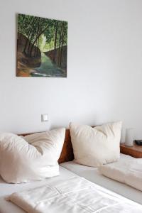 Ein Bett oder Betten in einem Zimmer der Unterkunft Apartmentcenter Koblenz
