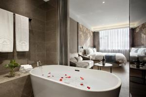 Posezení v ubytování Shenzhen Hanyong Hotel Fuyong Branch