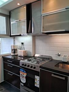 Recoleta, departamento de lujo a estrenar的厨房或小厨房