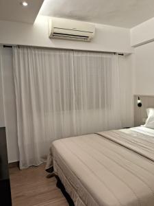 Recoleta, departamento de lujo a estrenar客房内的一张或多张床位