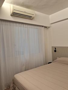 Recoleta, departamento de lujo a estrenar客房内的一张或多张床位