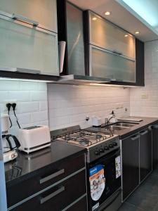 Recoleta, departamento de lujo a estrenar的厨房或小厨房