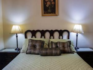 Ένα ή περισσότερα κρεβάτια σε δωμάτιο στο El paraíso de mi madre