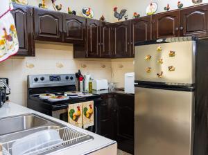 Η κουζίνα ή μικρή κουζίνα στο El paraíso de mi madre