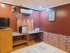 Køkken eller tekøkken på Walk Around Hotel