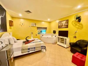 Et opholdsområde på Walk Around Hotel