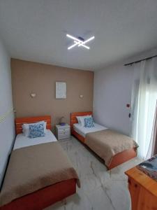 Postel nebo postele na pokoji v ubytování Dolphin Paradise Sozopoli