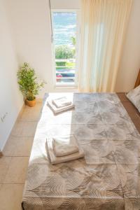 Postel nebo postele na pokoji v ubytování Adriatic Apartment + 25 fotografií
