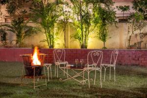 ウダイプールにあるAbhimanyu Mansion Emerald 1-Room Retreat With Common Outdoor Dining Area & Gardenのギャラリーの写真