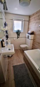 Łazienka w obiekcie Apartamenty Orchidea Łeba