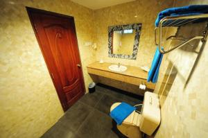 Koupelna v ubytování Nipah Island Resort + 37 fotografií