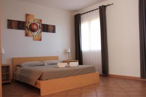 Кровать или кровати в номере Hotel Pedra Ruja