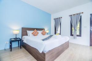 Postel nebo postele na pokoji v ubytování Baan Chuengkao Resort + 65 fotografií