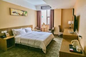 Ένα ή περισσότερα κρεβάτια σε δωμάτιο στο BI YING HOTEL +245 φωτογραφίες