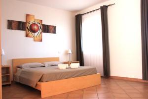 Кровать или кровати в номере Hotel Pedra Ruja