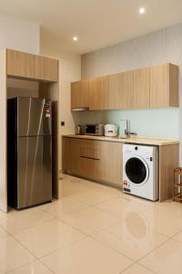 Kuchyň nebo kuchyňský kout v ubytování urban sea view home 2bed studio