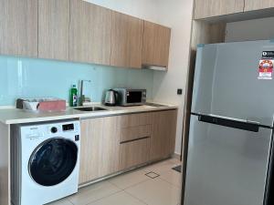 Kuchyň nebo kuchyňský kout v ubytování urban sea view home 2bed studio