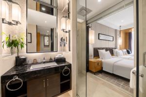 Voodi või voodid majutusasutuse Lyhn International Hotel Chengdu Taikoo Li toas