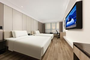 TV a/nebo společenská místnost v ubytování Atour Hotel Three Lanes and Seven Alleys Fuzhou