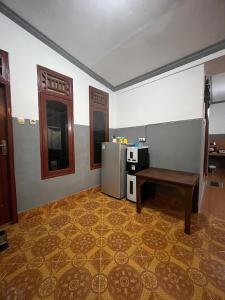 Kuchyň nebo kuchyňský kout v ubytování Bintang Guesthouse