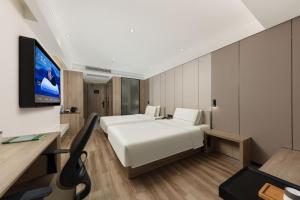 TV a/nebo společenská místnost v ubytování Atour Hotel Three Lanes and Seven Alleys Fuzhou